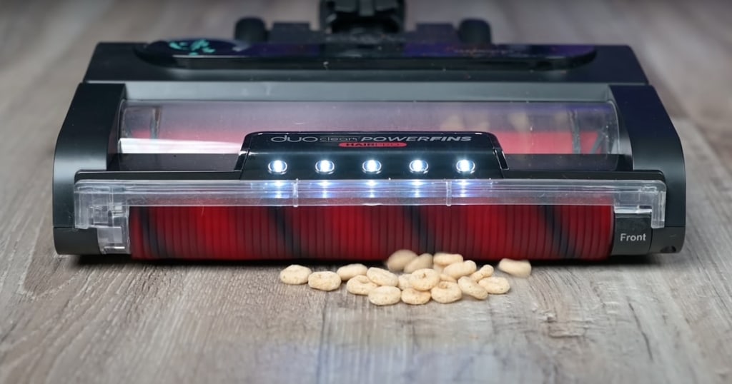 Stratos Cordless Vacuuming Cereal on Hard Floor